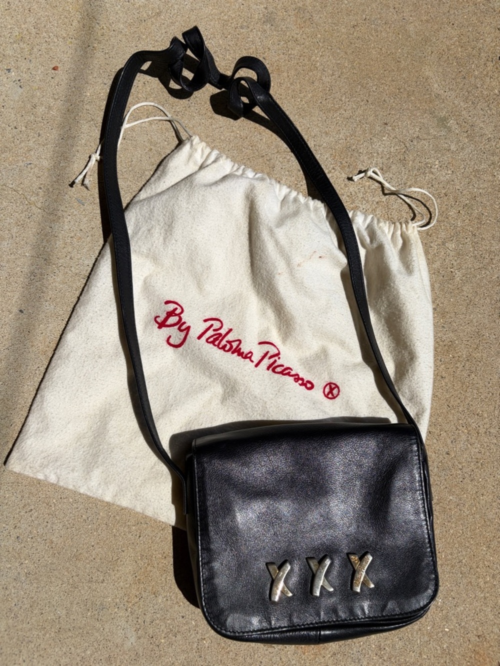 By Paloma Picasso leather crossbody